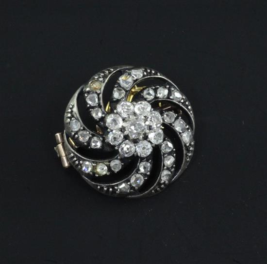 A Victorian gold, silver and diamond circular brooch, 0.75in.